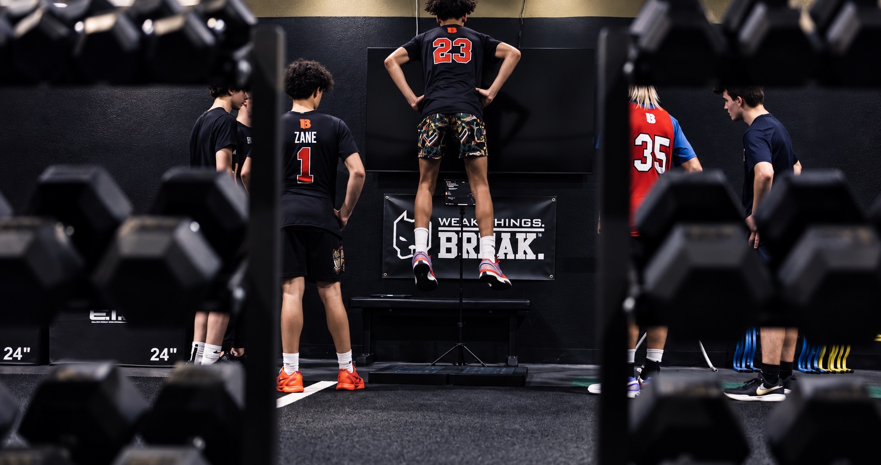 Basketball athletes practicing vertical jumps at Legendary Strength